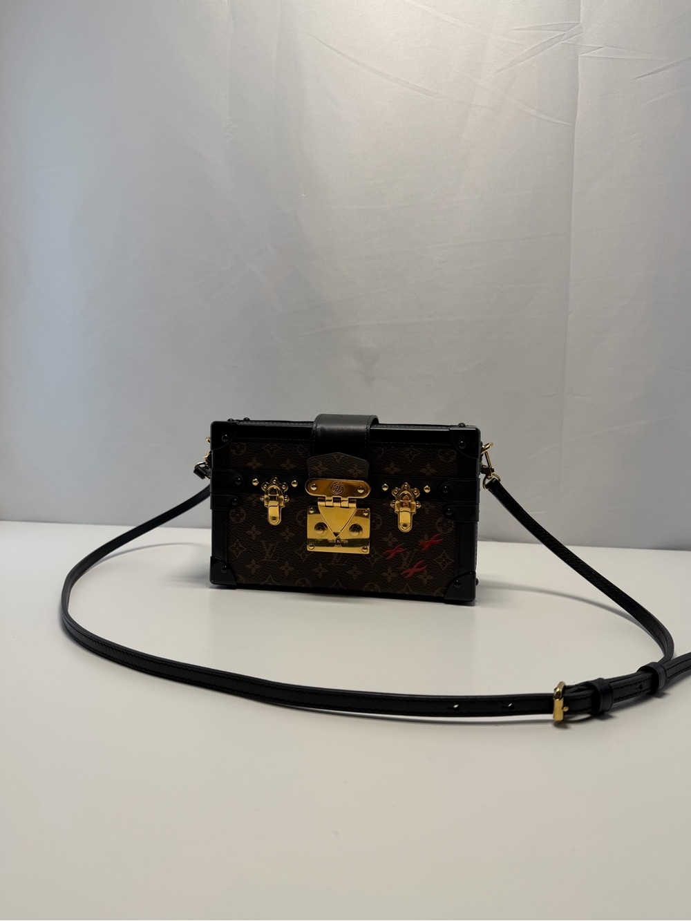 LOUIS VUITTON
Limited Edition Monogram Canvas Petite Malle Bag